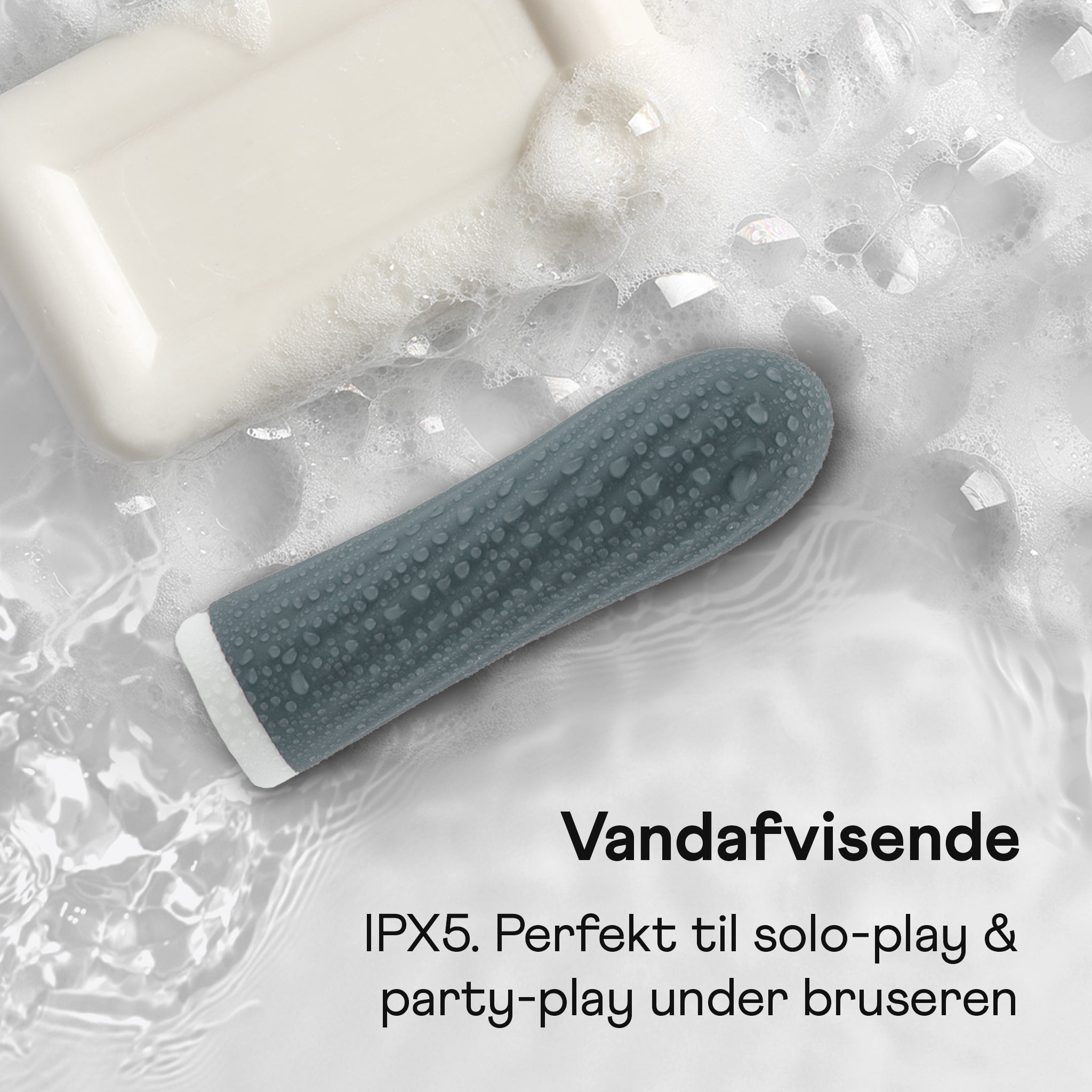 Amina Bounce graphite mini vibrator liggende i vand